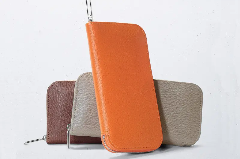 ROUND ZIPPER WALLETS – Camille Fournet